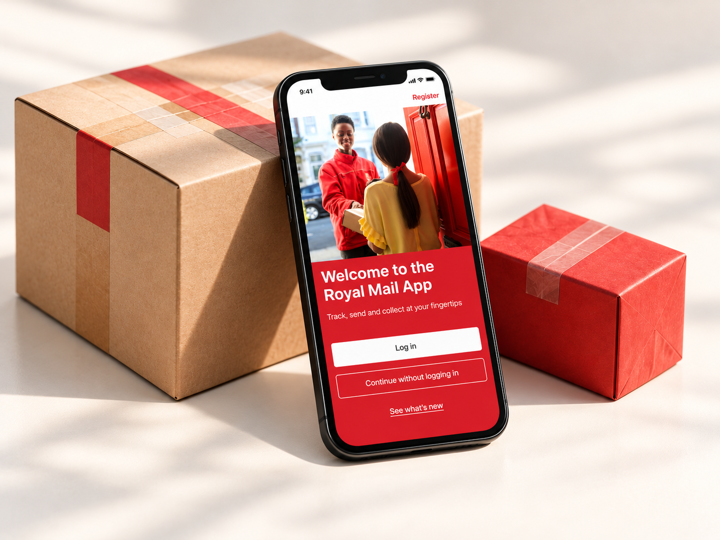 Royal Mail welcome-screen design from the project presentation, recreated on a phone beside parcels